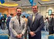 Attorneys Stephen Kopko and Joseph Price Sponor booth at Junior Achievement
