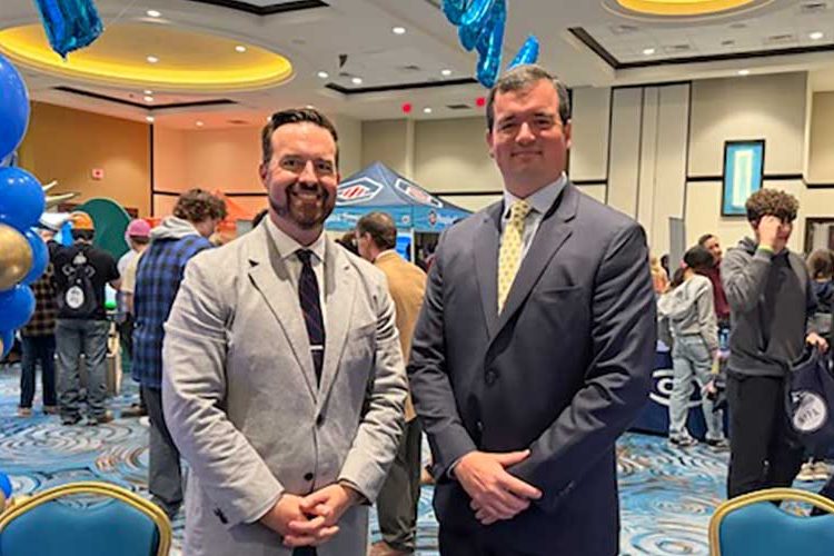 Attorneys Stephen Kopko and Joseph Price Sponor booth at Junior Achievement