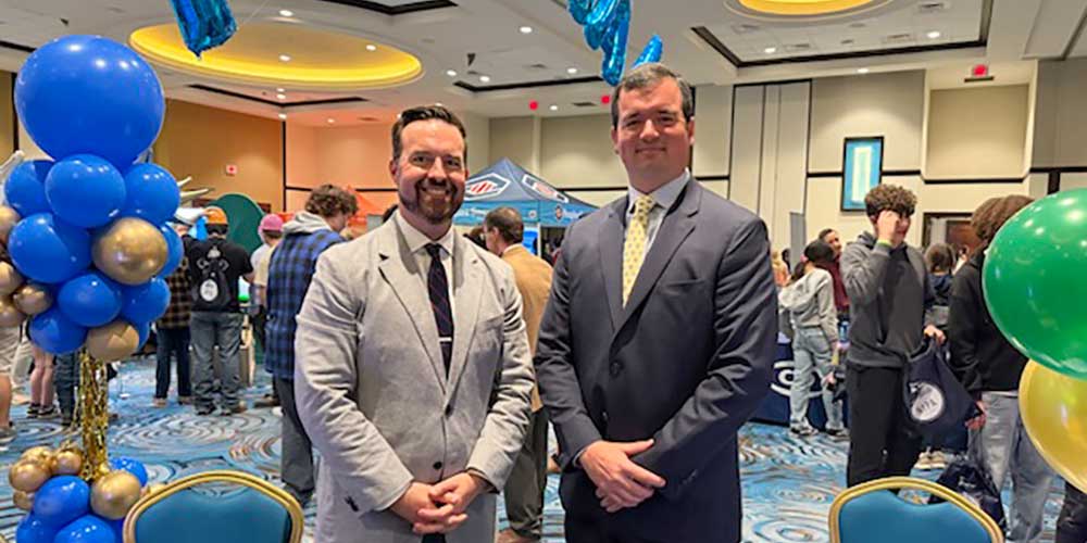 Attorneys Stephen Kopko and Joseph Price Sponor booth at Junior Achievement